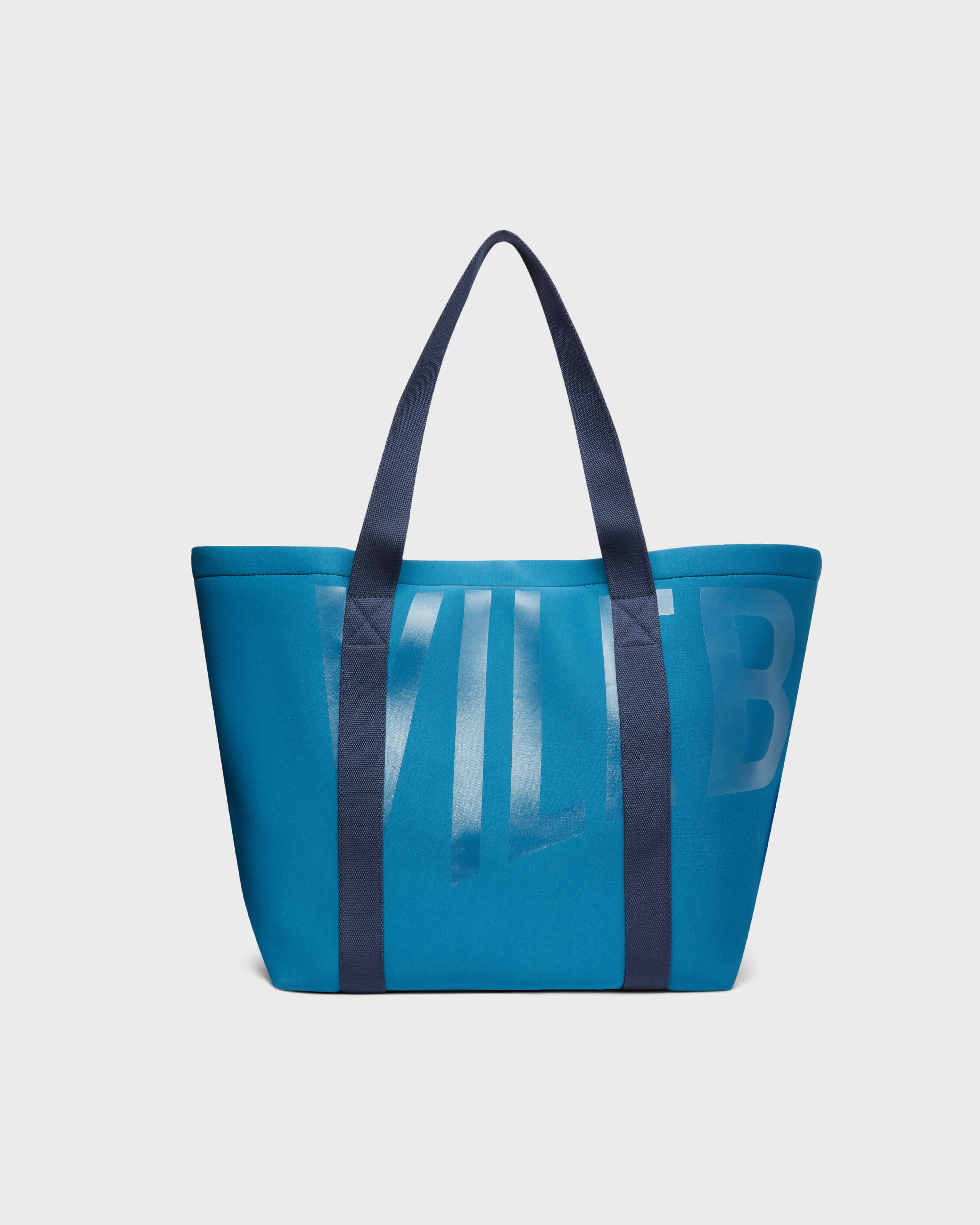 Bolso de playa grande en neopreno de color liso unisex PEACOCK frontworn view