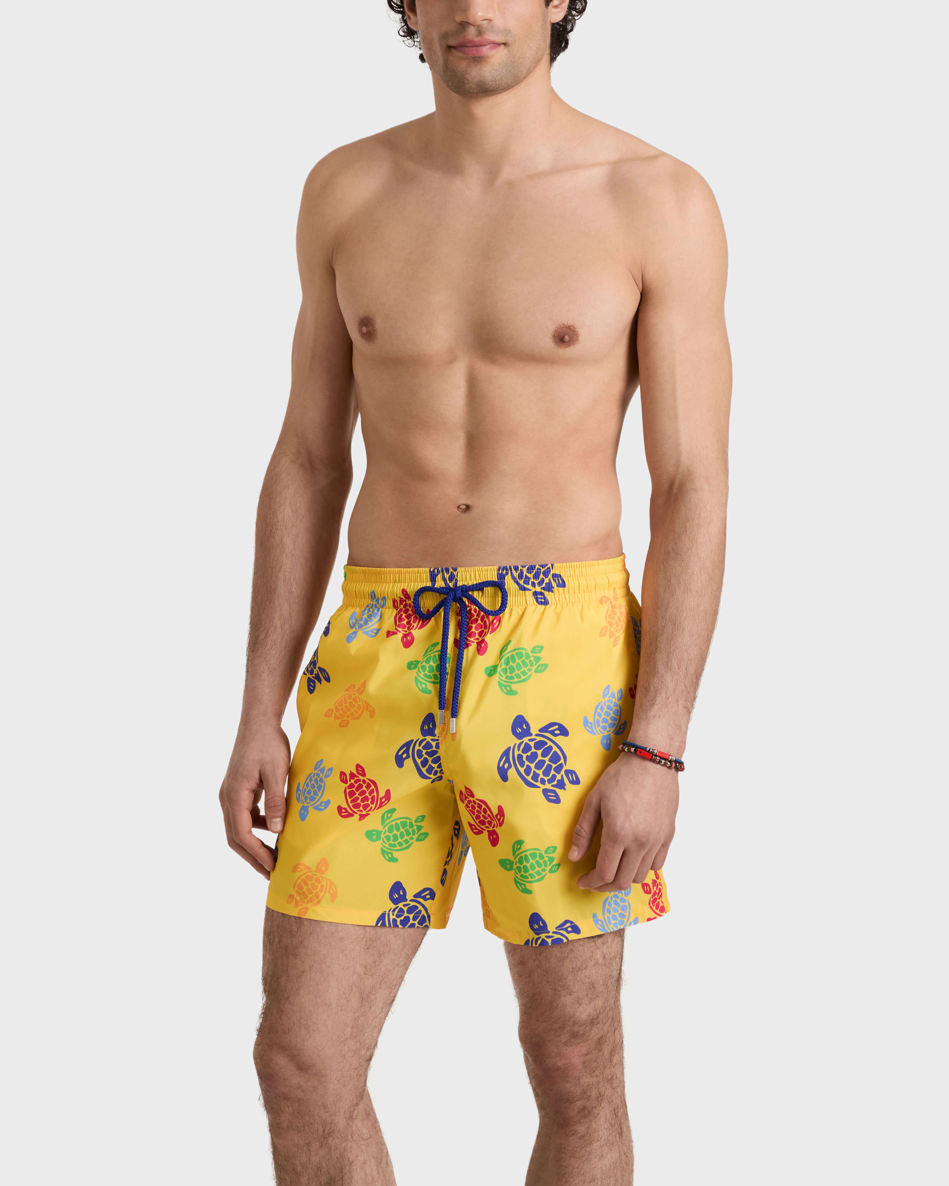 Ultraleichte und verstaubare Tortues Multicolores Badeshorts für Herren MAIS frontworn view