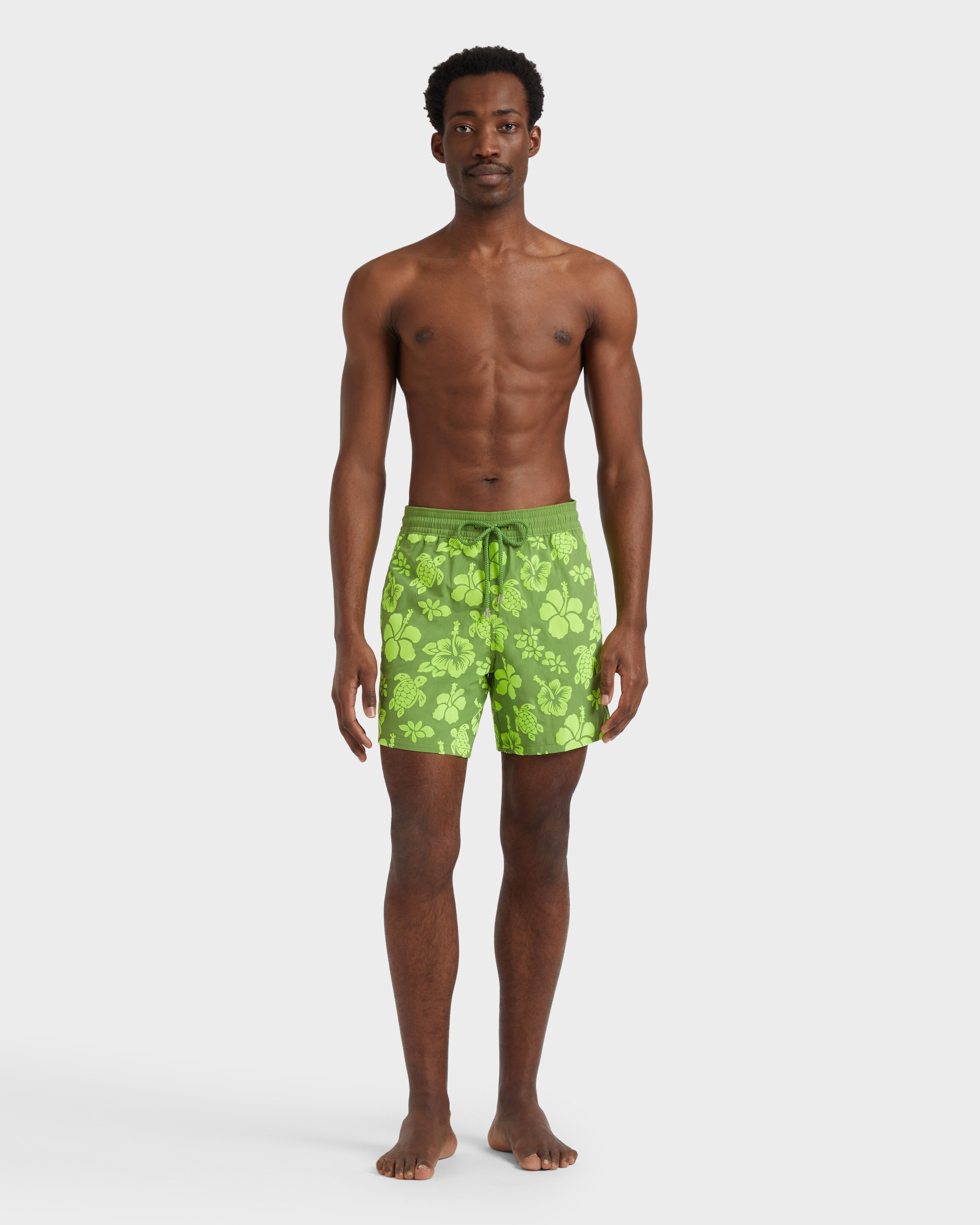 Men Swim Shorts Flocked Tropical Turtles CAMOUPLAGE frontworn view