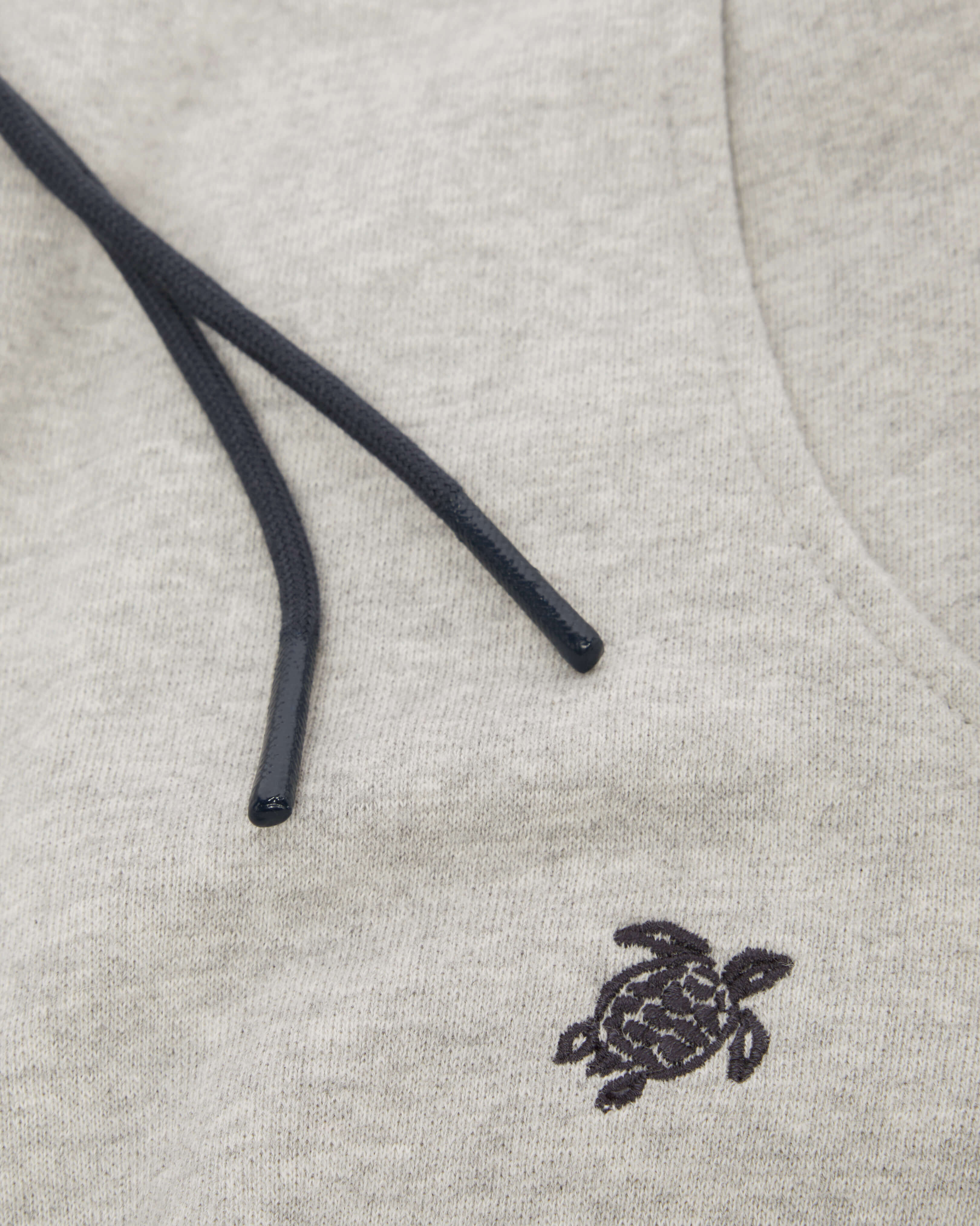 Joggers con tortuga bordada para niño GRIS JASPEADO look1 view