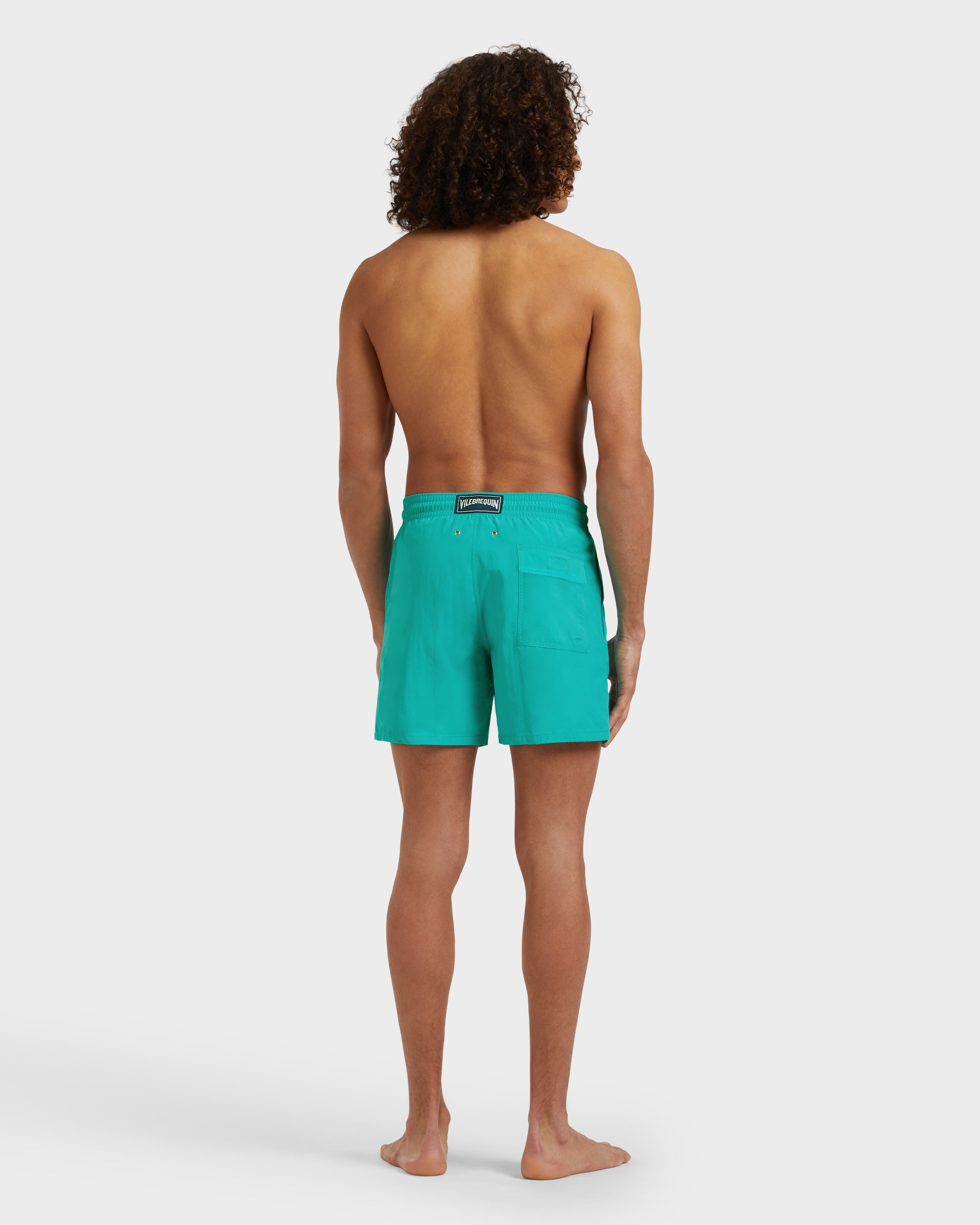 Men Swim Shorts Water-reactive Whales DISCO GREEN backworn view