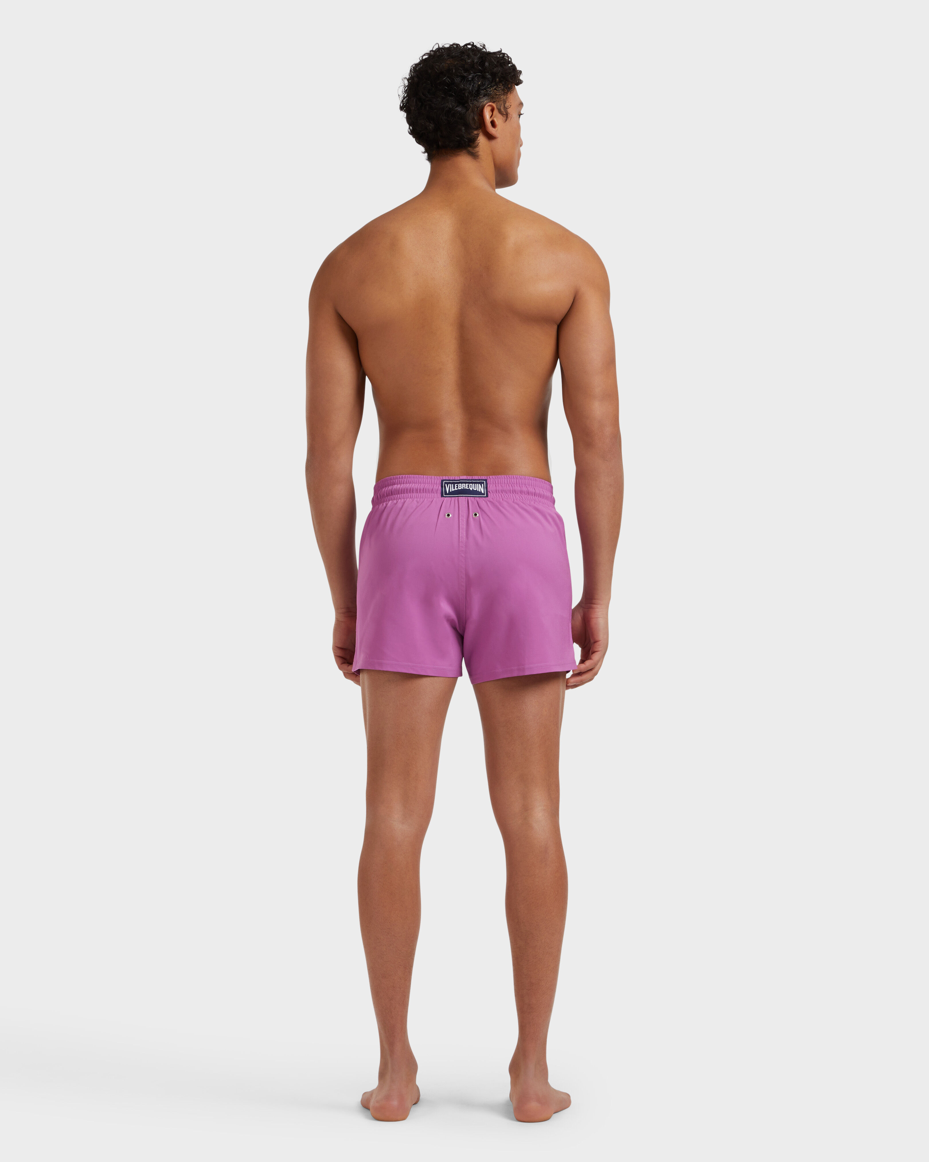 Men Swimwear Short and Fitted Stretch Solid PINK DAHLIA backworn view