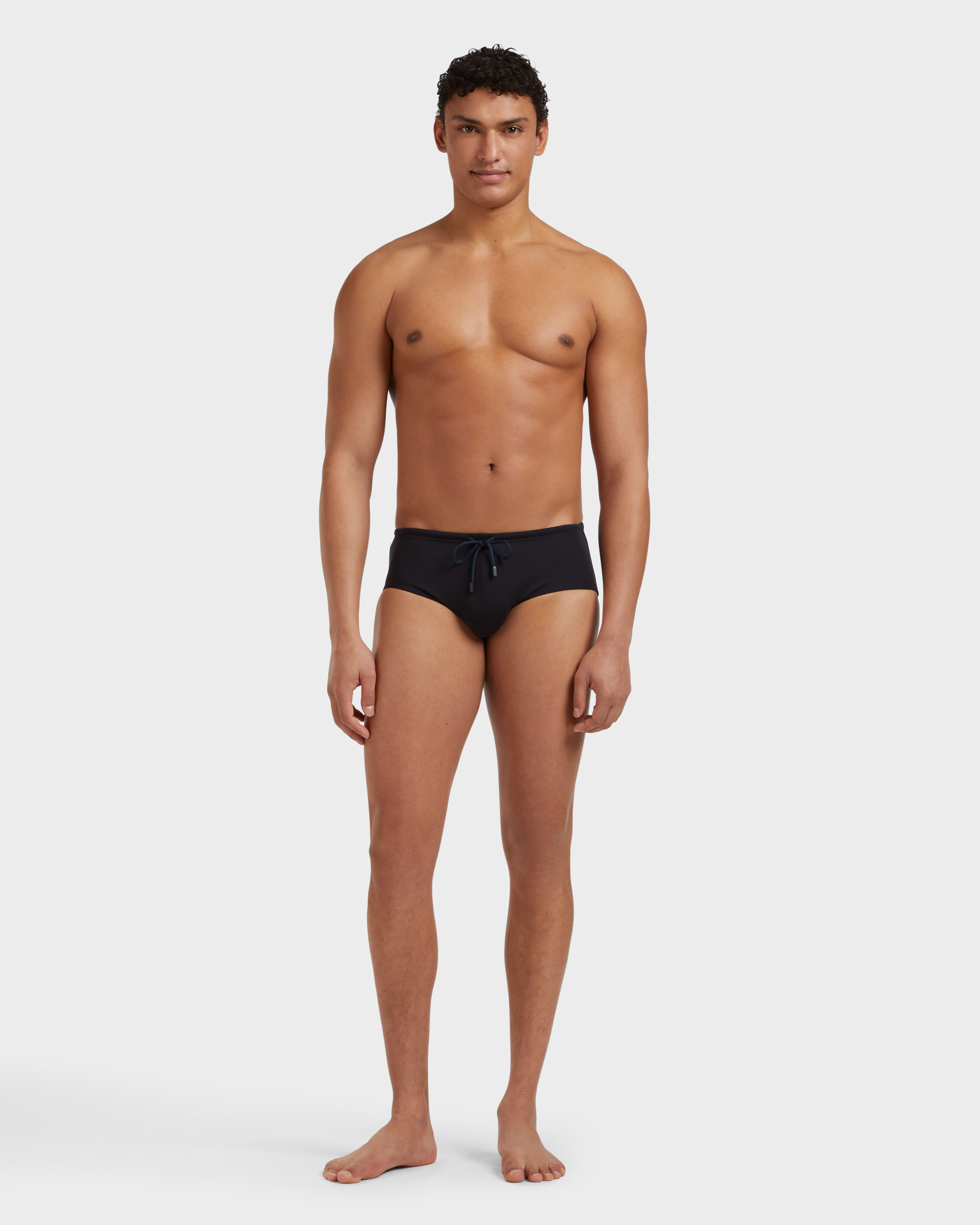 Men Swim brief Solid BLACK frontworn view