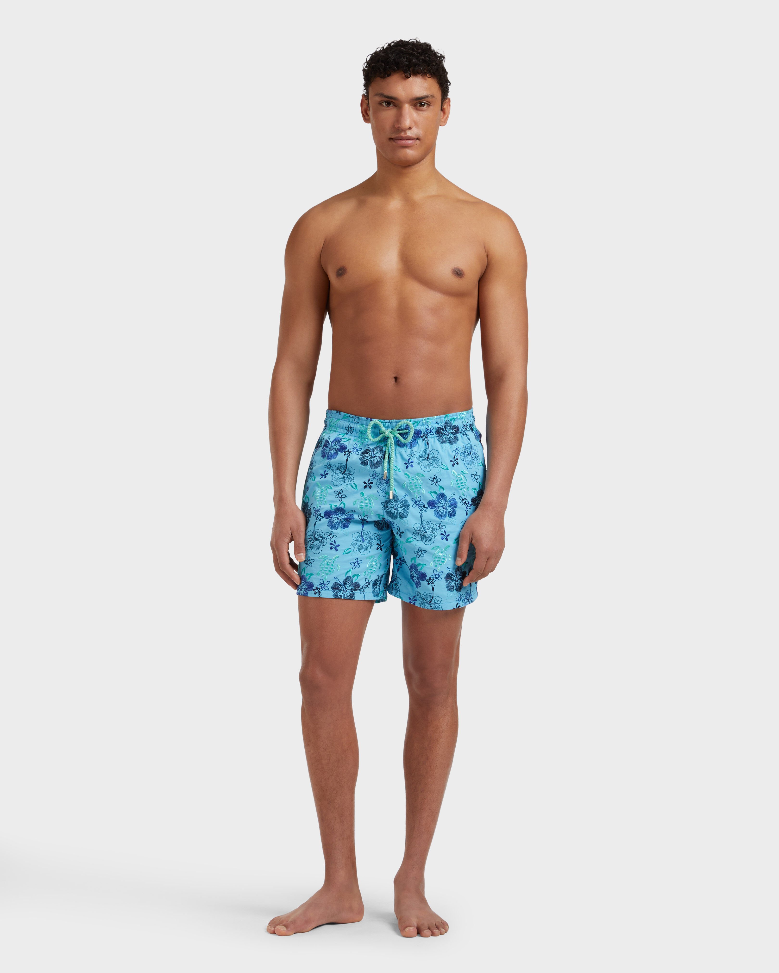 Men Swim Shorts Embroidered Tropical Turtles - Limited Edition BLUE TOPAZ frontworn view
