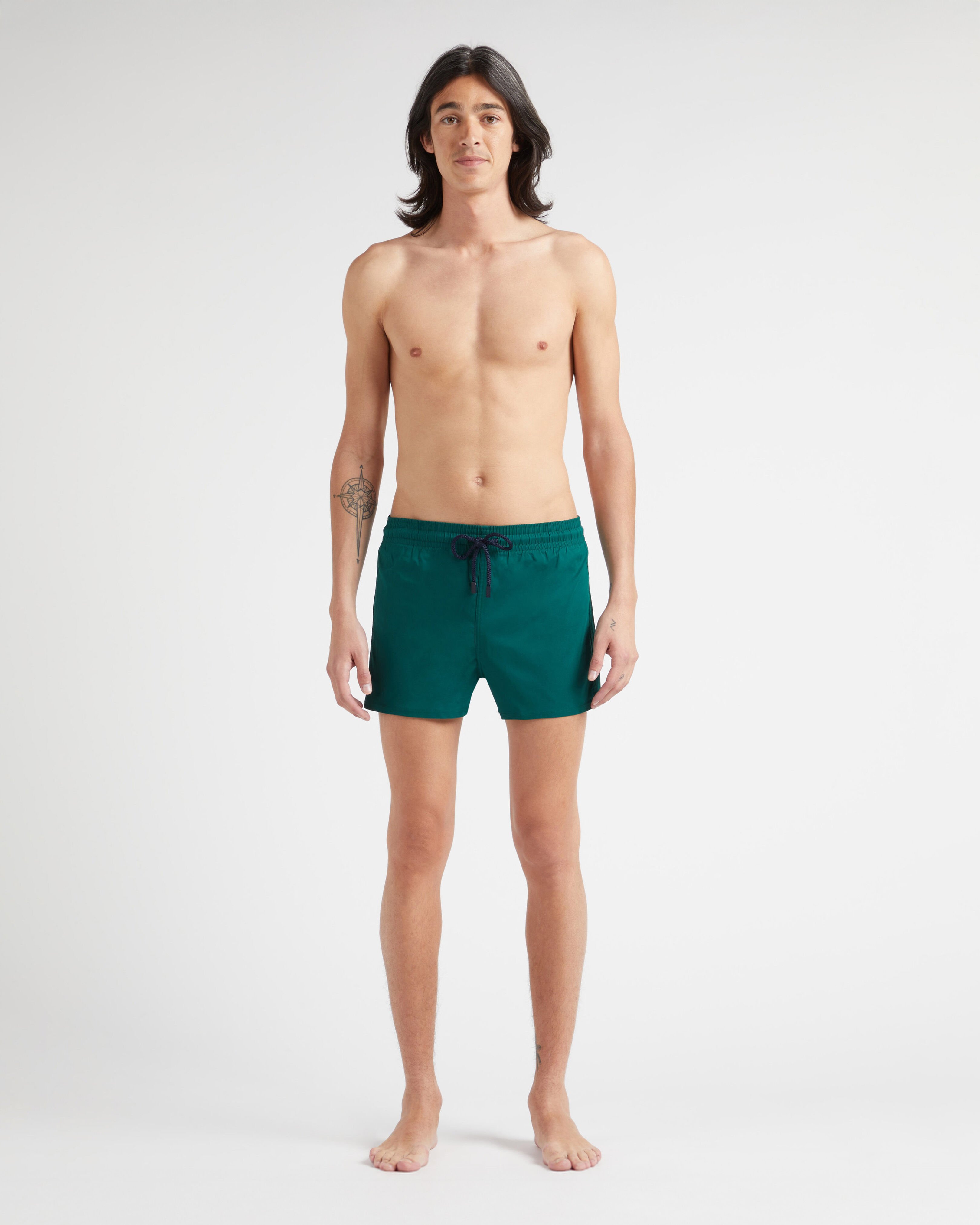 Men Swimwear Short and Fitted Stretch Solid IVY frontworn view
