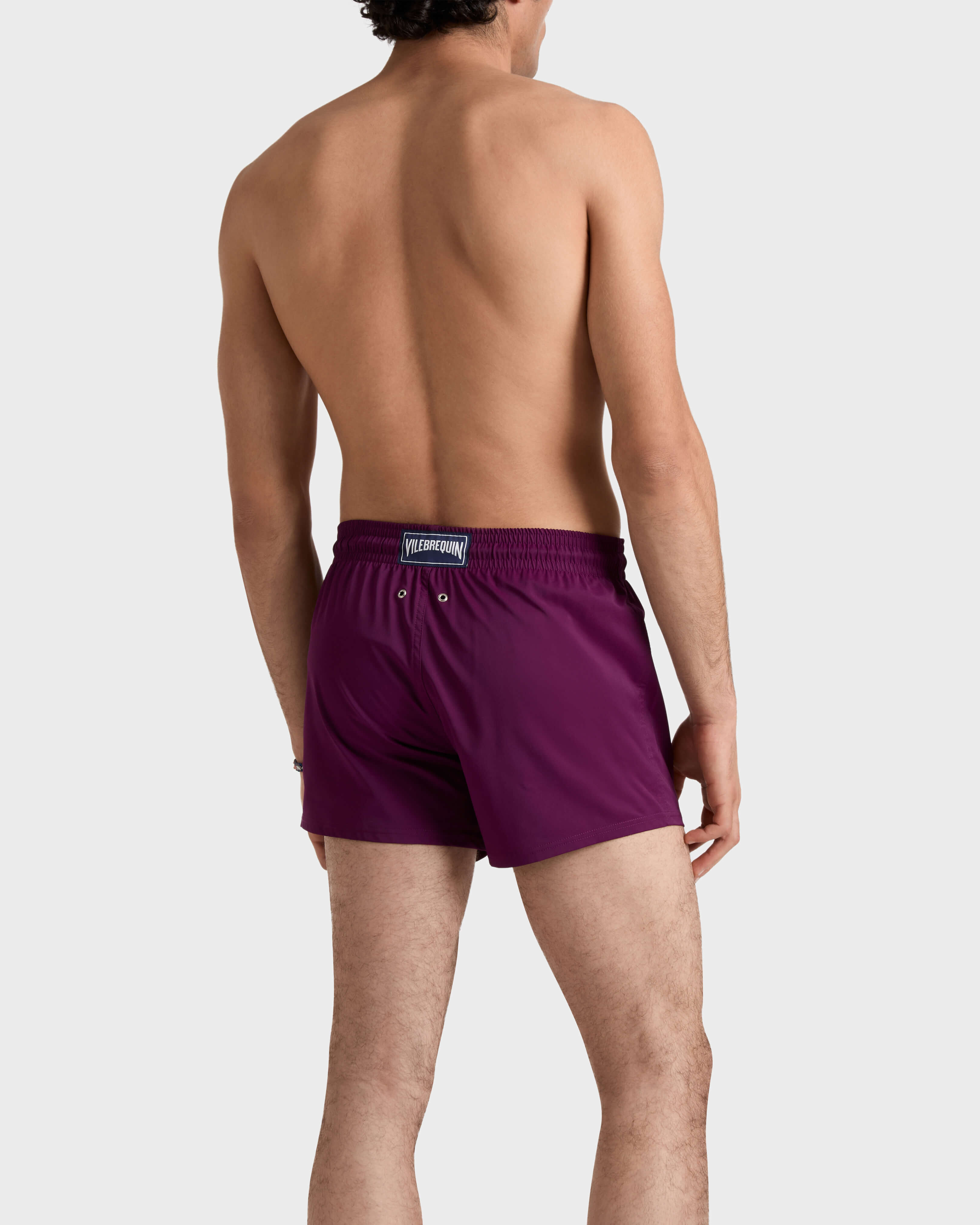 Costume da bagno corto uomo stretch e aderente a tinta unita KERALA backworn view