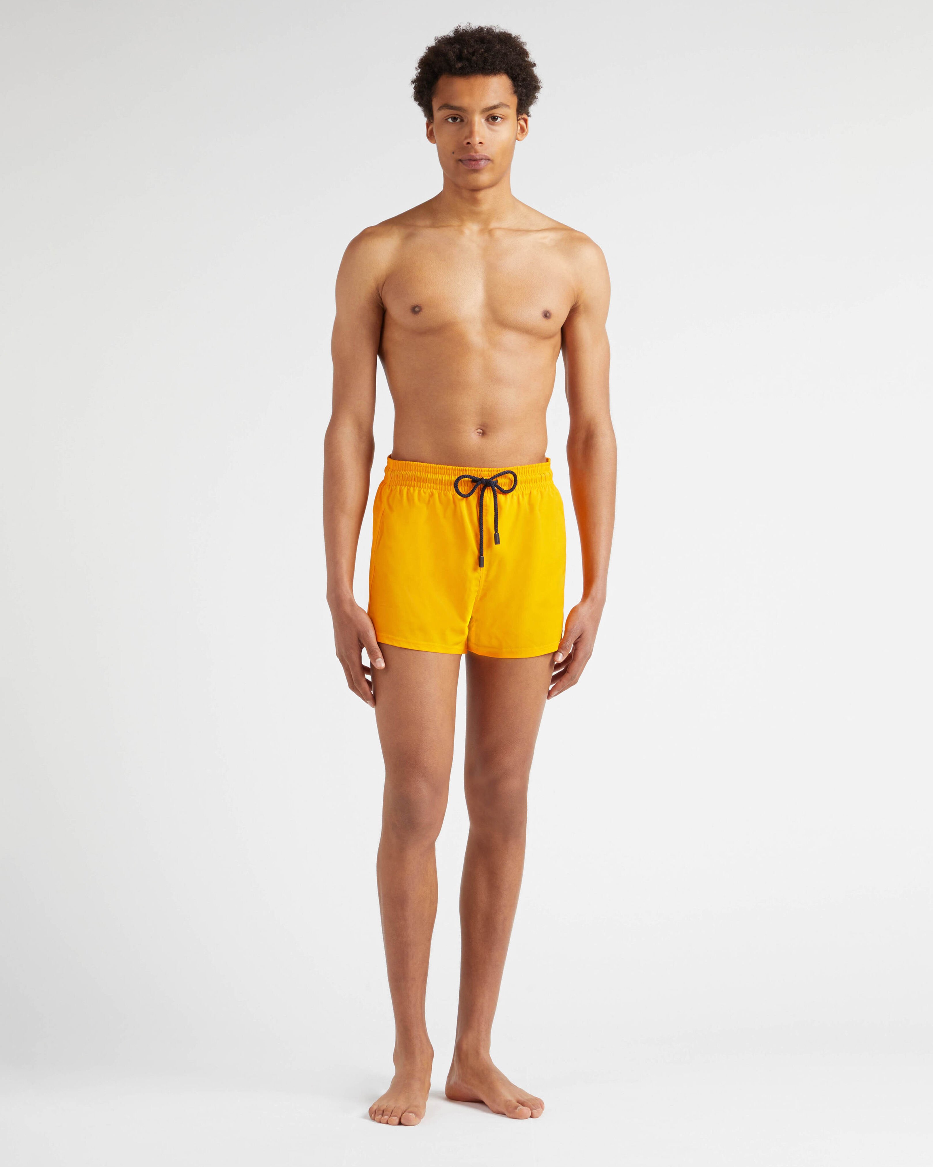 Men Swimwear Short and Fitted Stretch Solid MANGO frontworn view