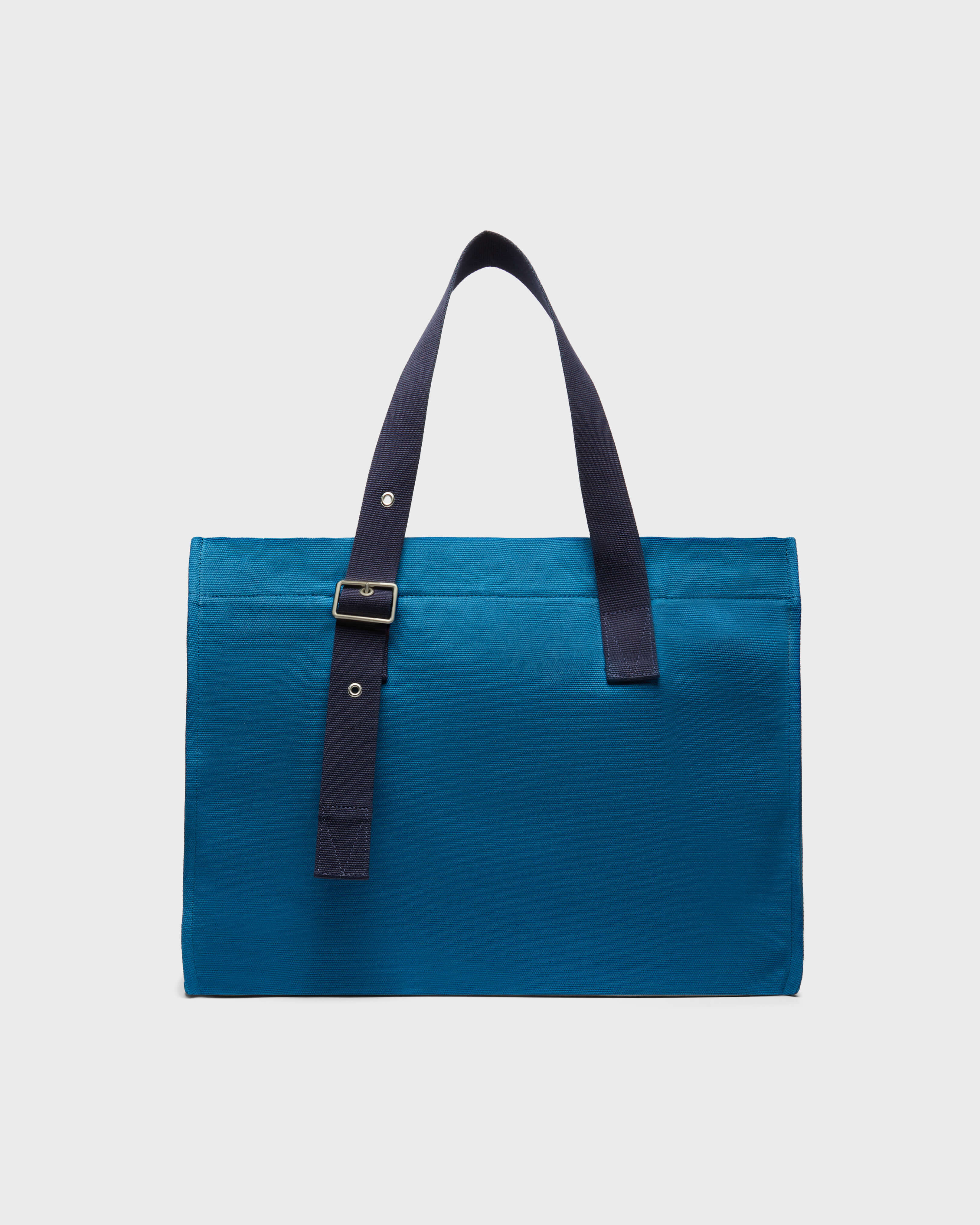 Bolsa de playa grande en algodón de color liso PEACOCK frontworn view