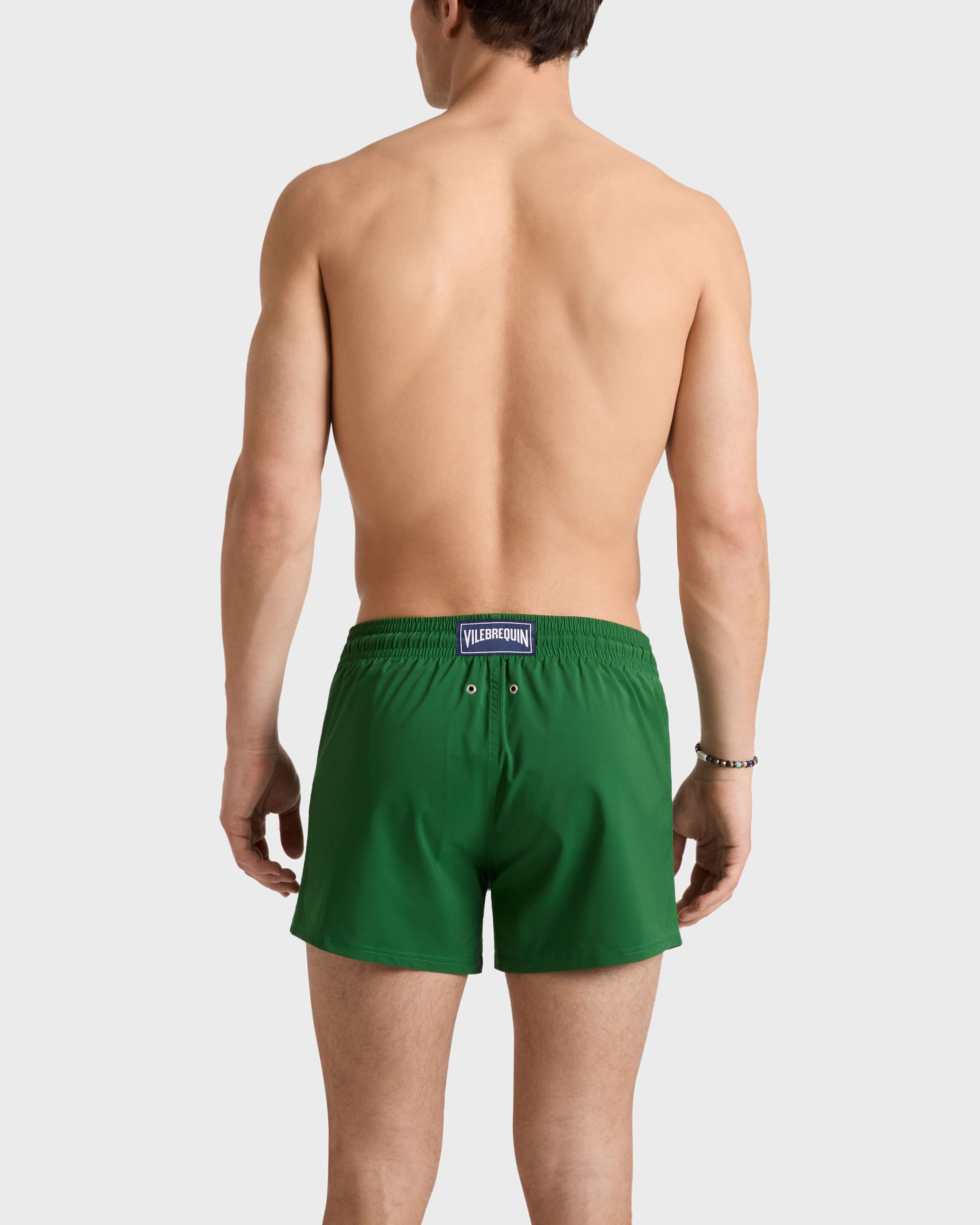 Men Swimwear Short and Fitted Stretch Solid TROPICAL backworn view