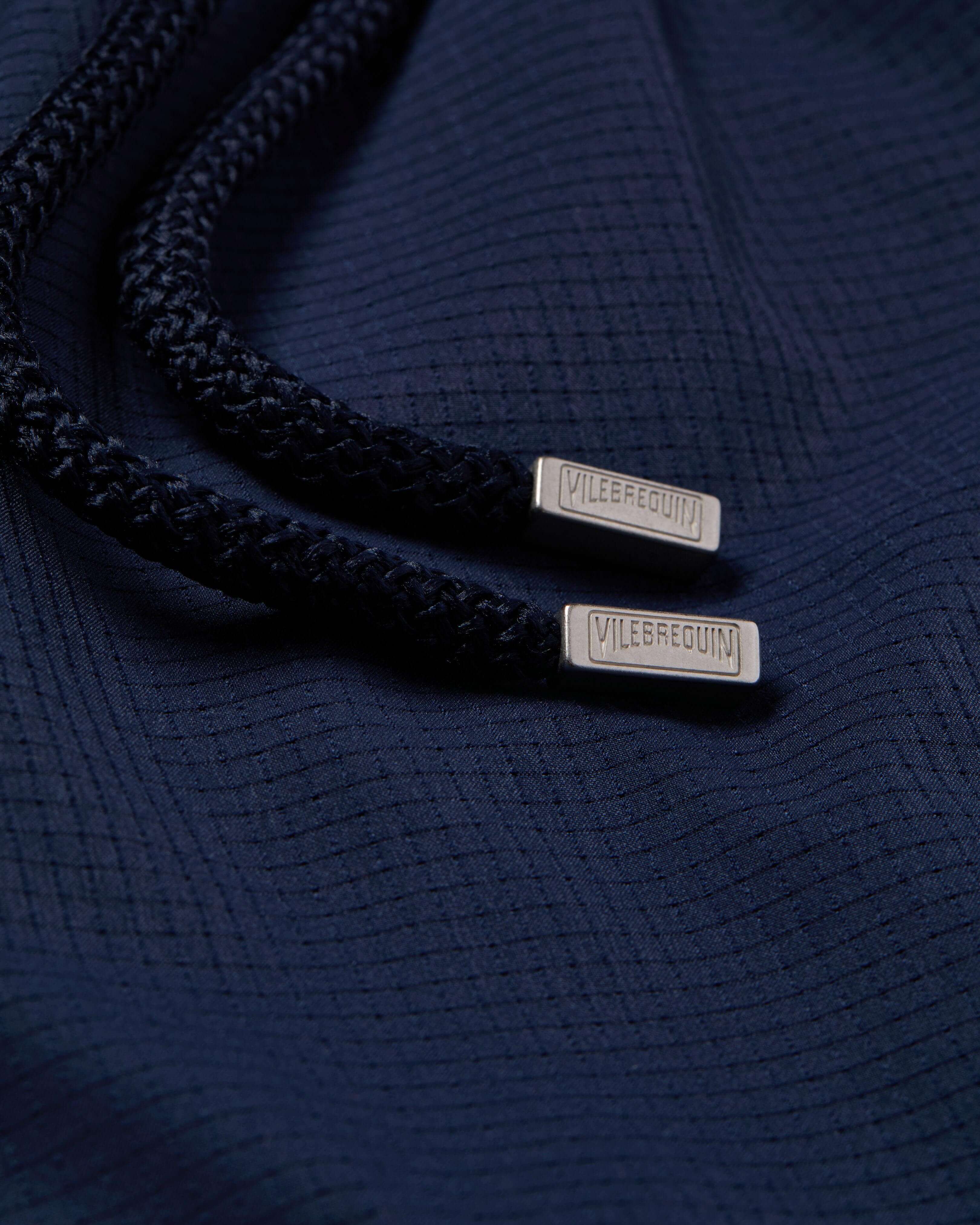 Bañador microperforado ultraligero y plegable de color liso para hombre AZUL MARINO supp1 view