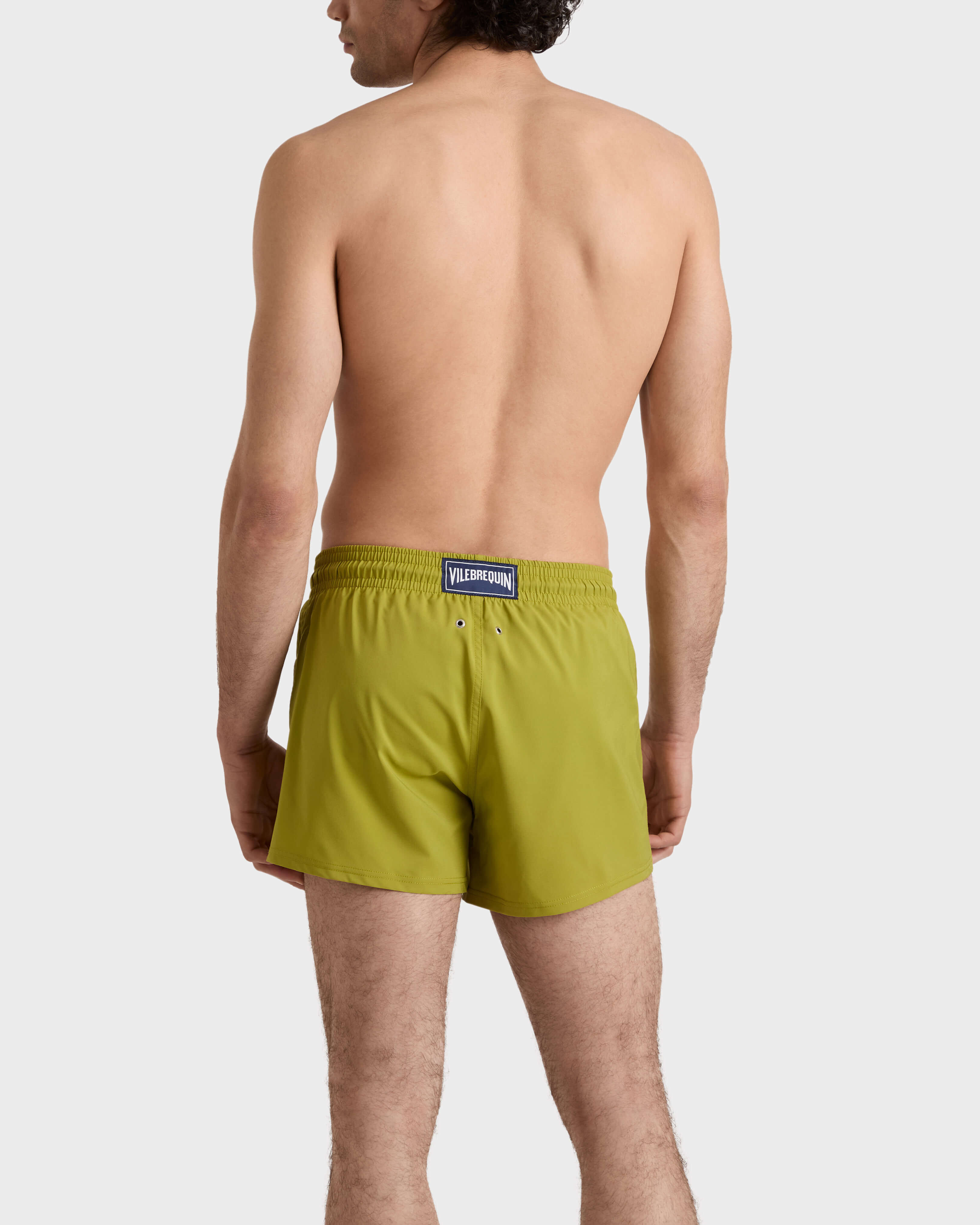 Men Swimwear Short and Fitted Stretch Solid WORMWOOD backworn view