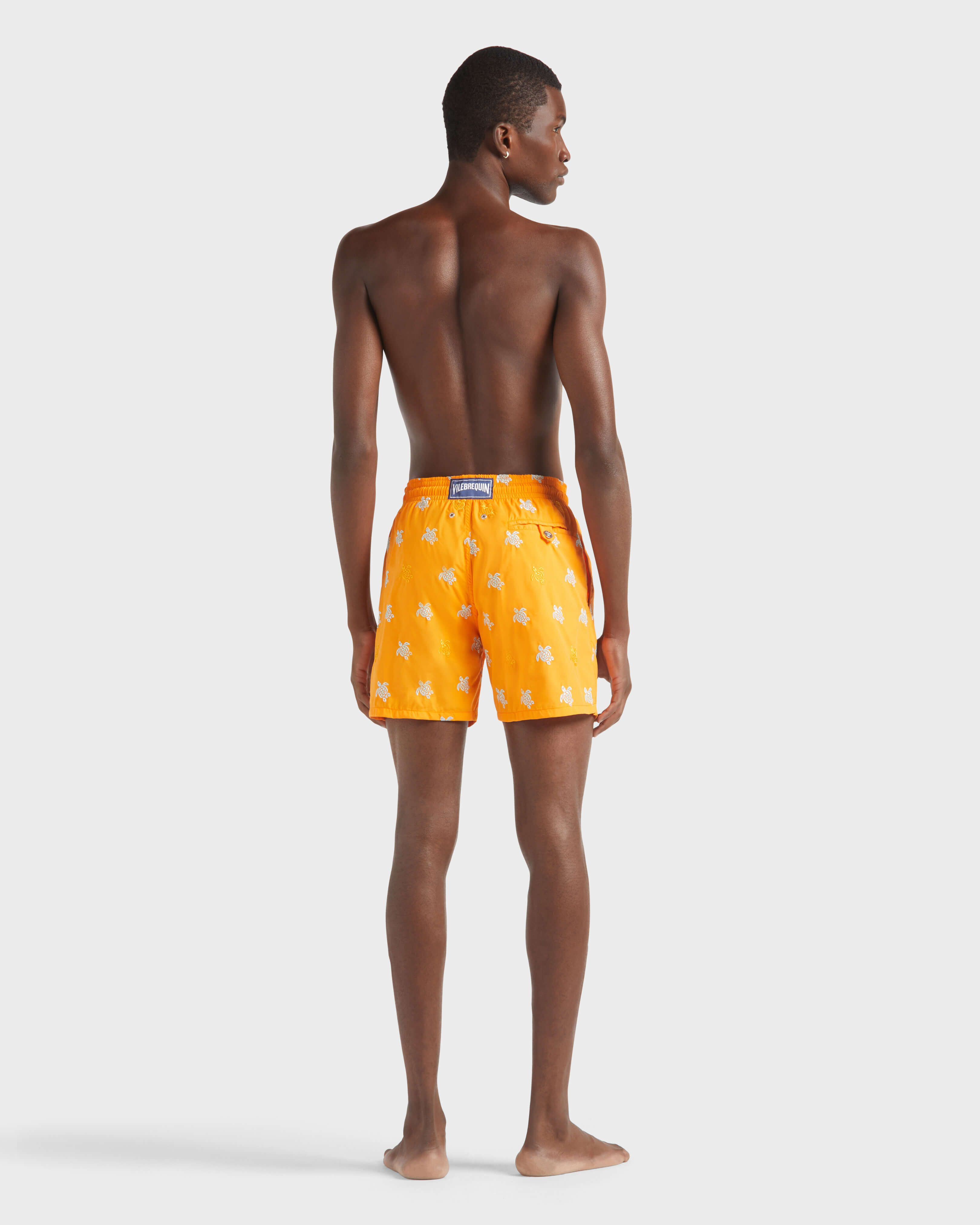 Men Swim Trunks Embroidered Micro Ronde des Tortues Diagonale - Limited Edition CARROT backworn view
