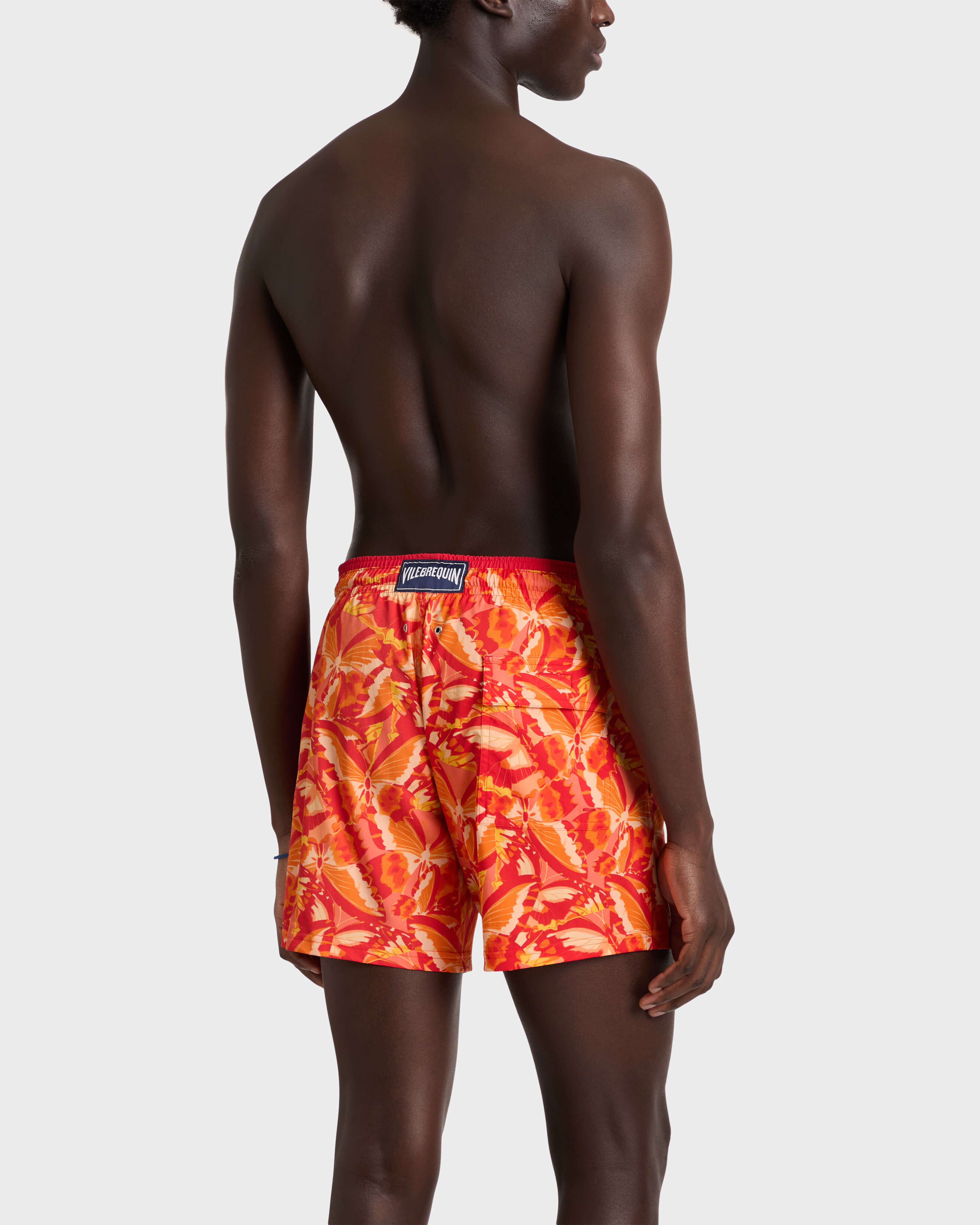Dama Pintada Stretch-Badeshorts für Herren MOHNROT backworn view