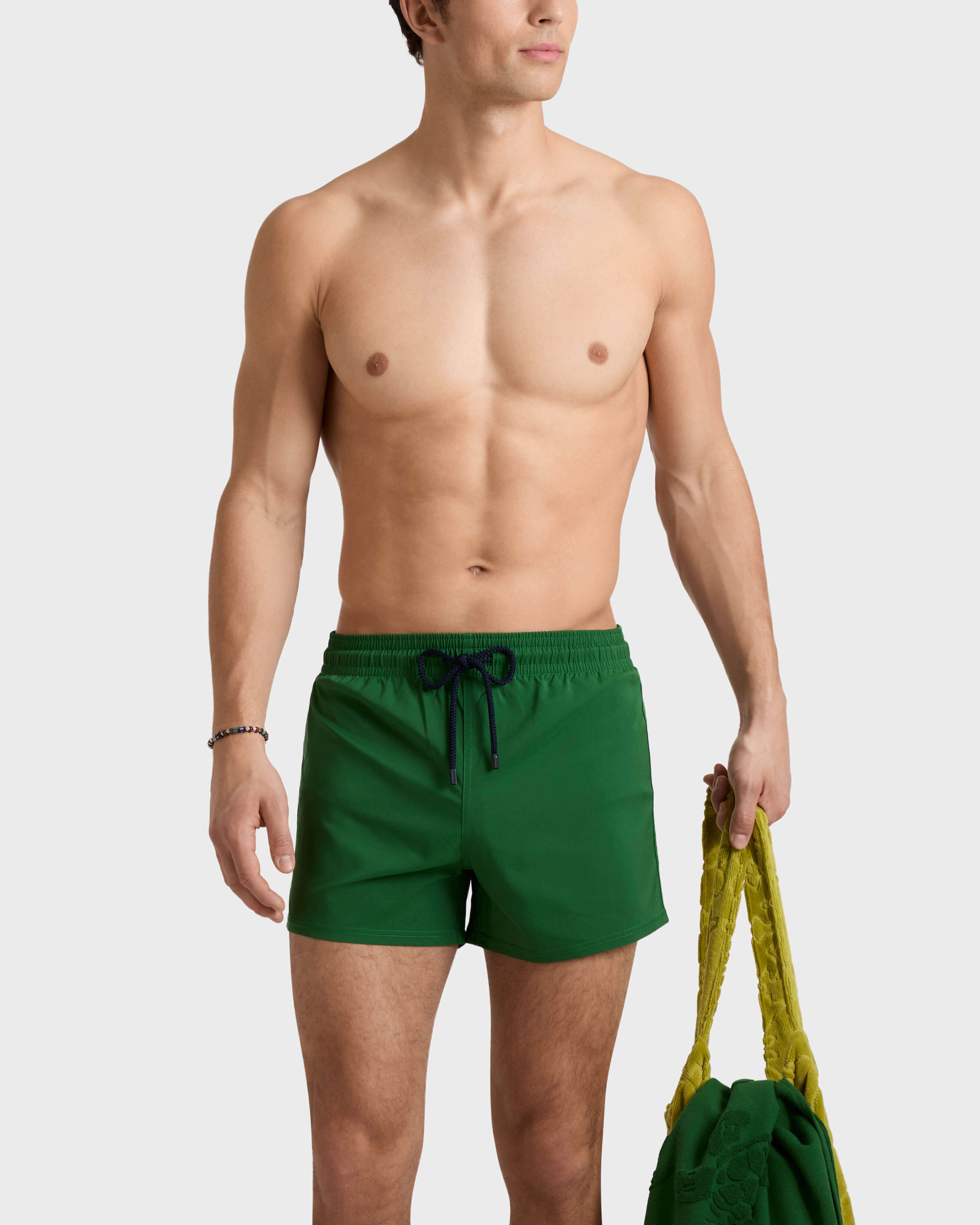 Men Swimwear Short and Fitted Stretch Solid TROPICAL frontworn view