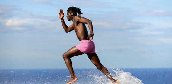 Man wearing recycled men swimsuit