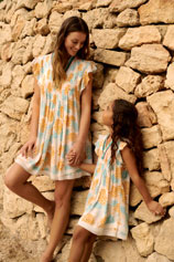  Mother and daughter wearing exclusive VBQ x Poupette St Barth dresses