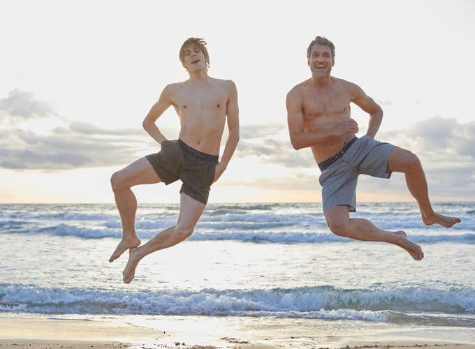 Two men jumping