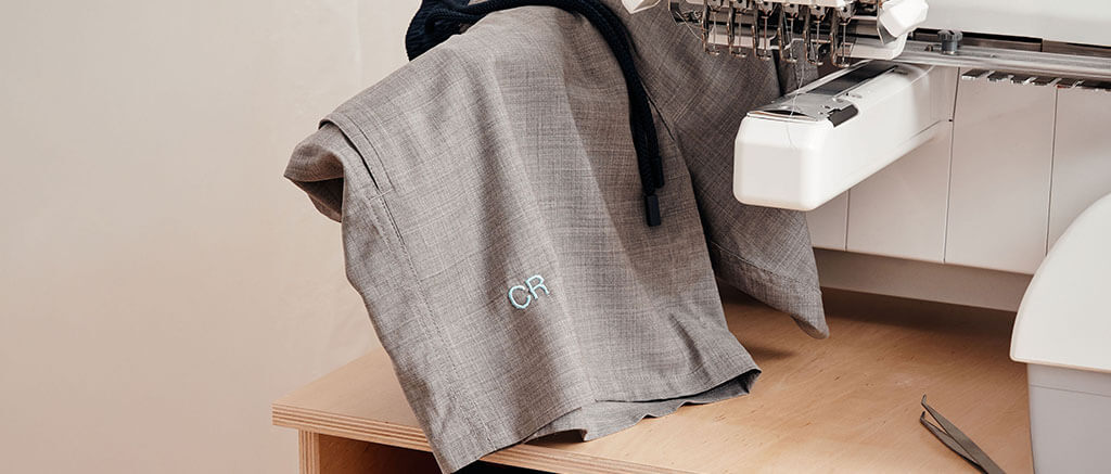 Tailoring of a men swim trunk with monogram Tailoring of a men swim trunk with monogram