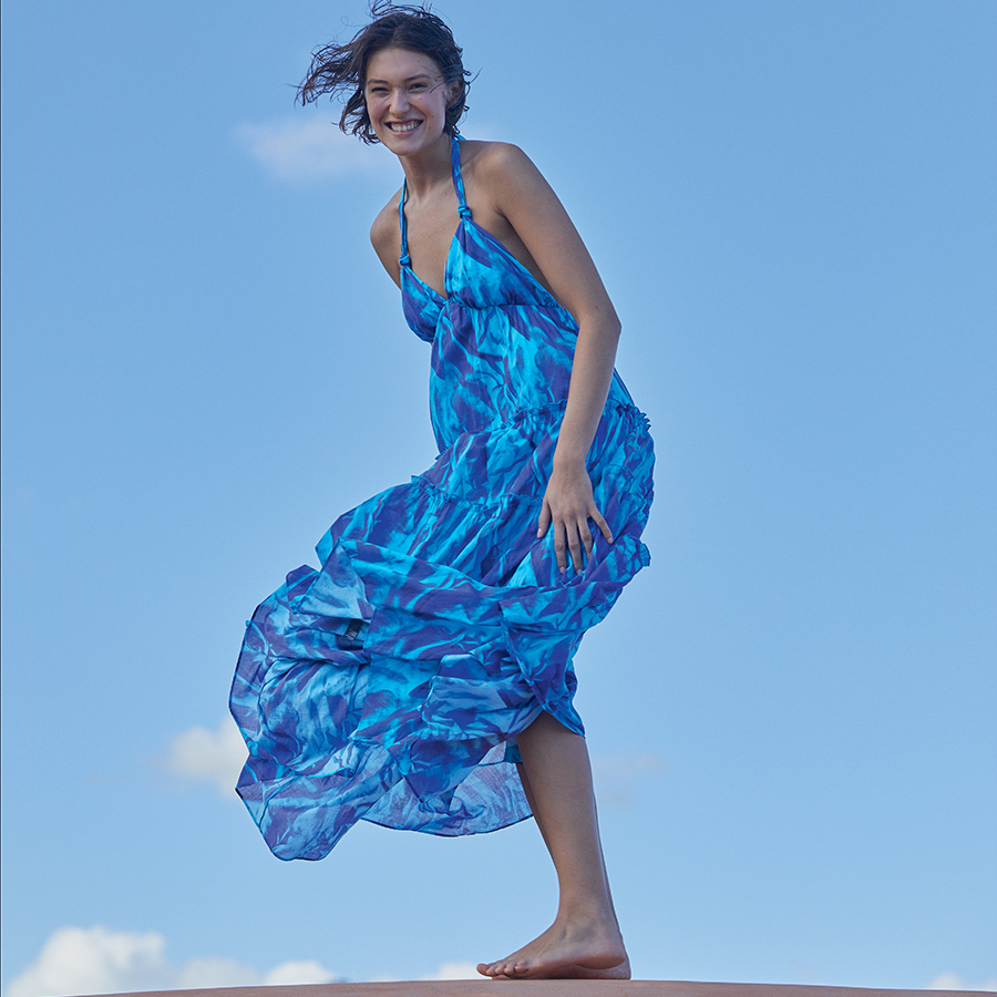 A woman wearing the Women Cotton Long Backless Dress Les Draps Froissés