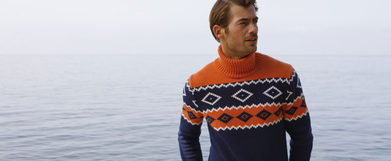 Cruise 23 man wearing a turtleneck wool sweater