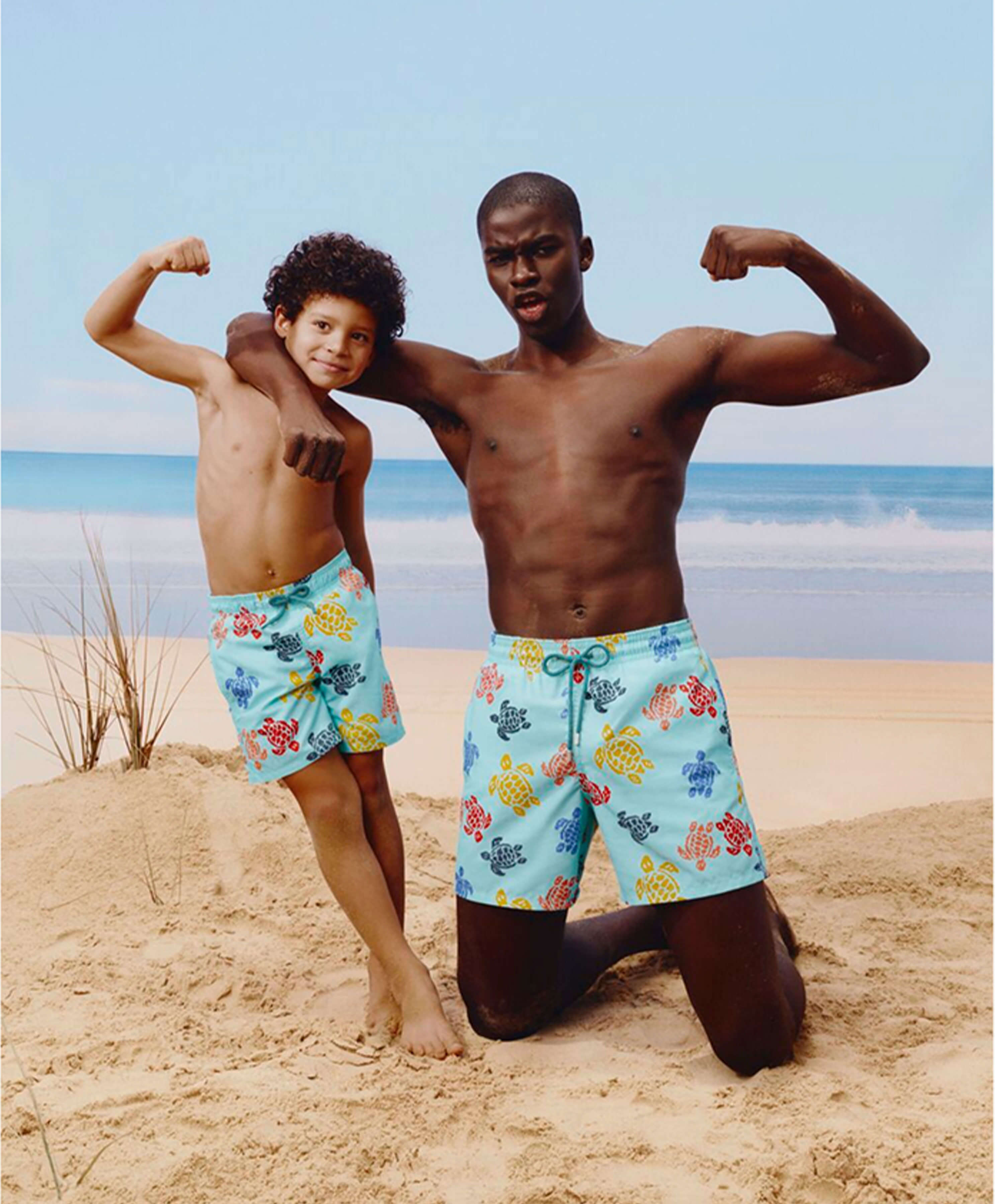 A dad and his son at the beach