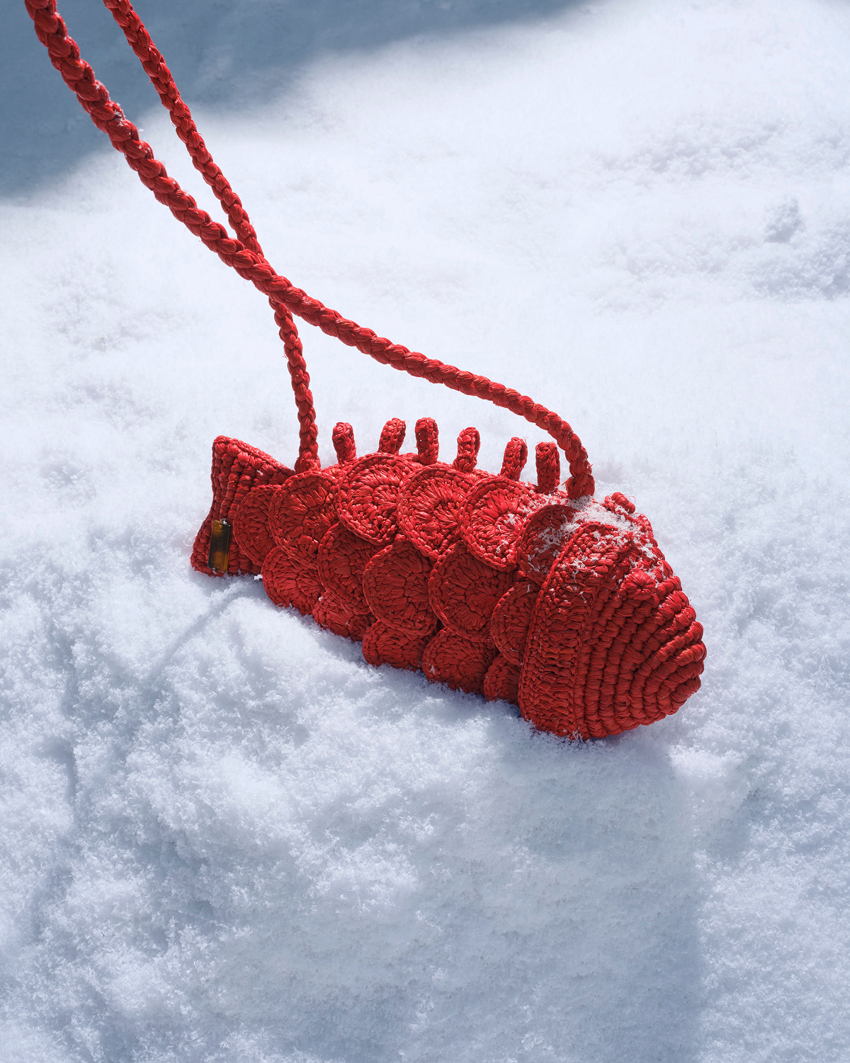 A fun, sophisticated bag handcrafted from raffia crochet