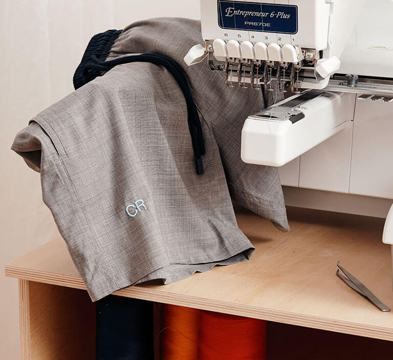 Tailoring of a men swim trunk with monogram Tailoring of a men swim trunk with monogram