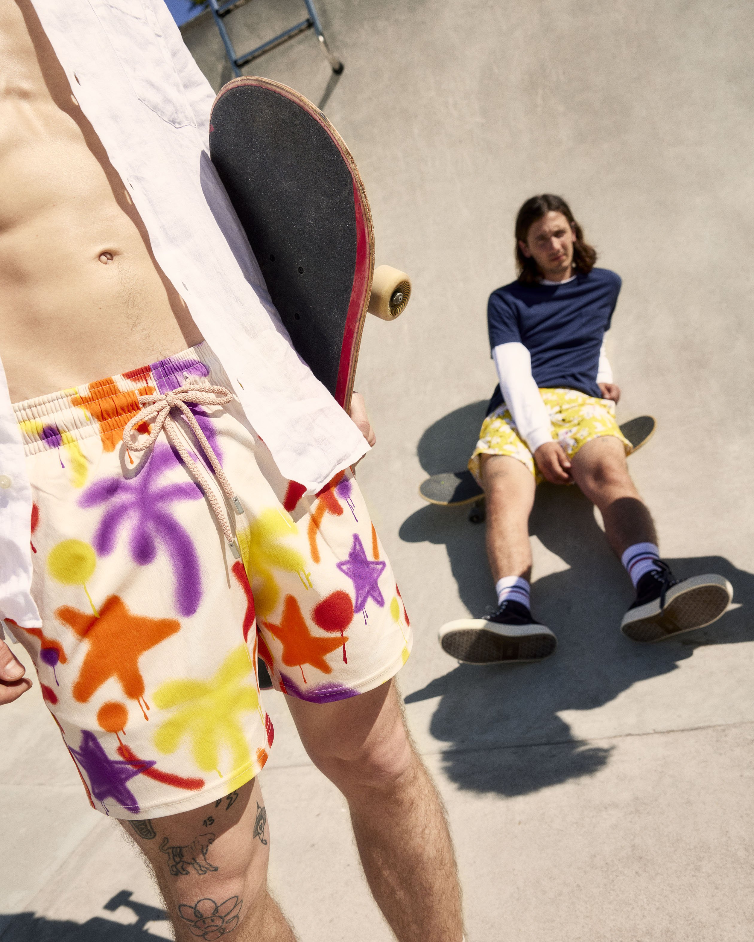 3 men wearing palm angels in a skate park