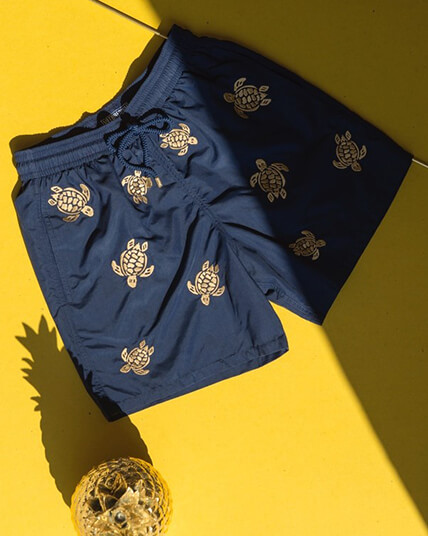 Navy blue swimsuit embroidered with elephant gold threads