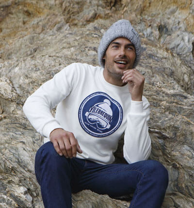 man wearing a Vilebrequin printed sweatshirt