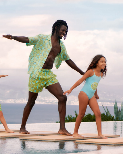 Man wearing Vilebrequin swimsuit