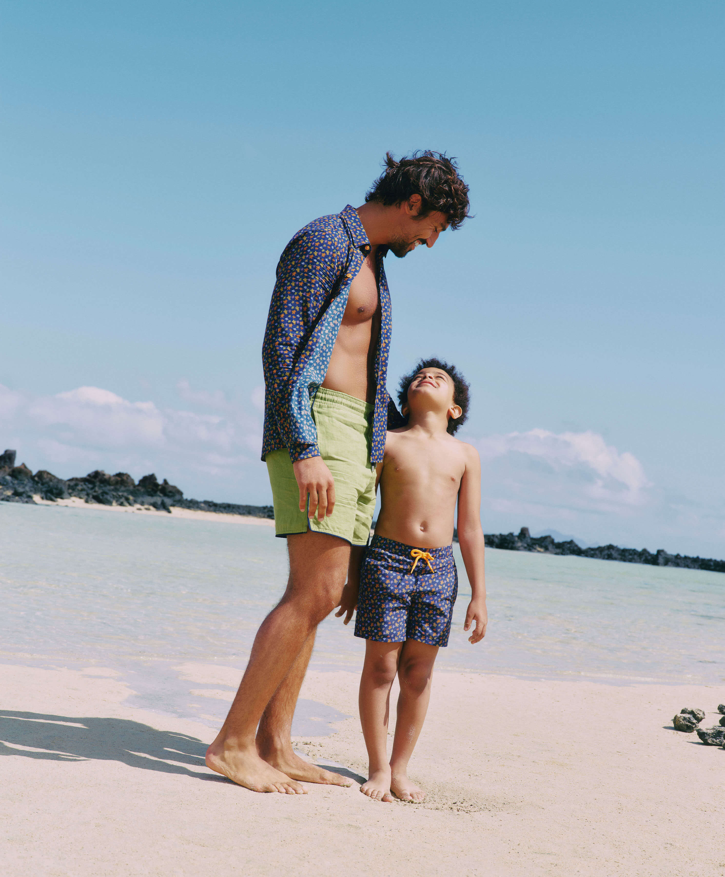 A father and his son on the beach