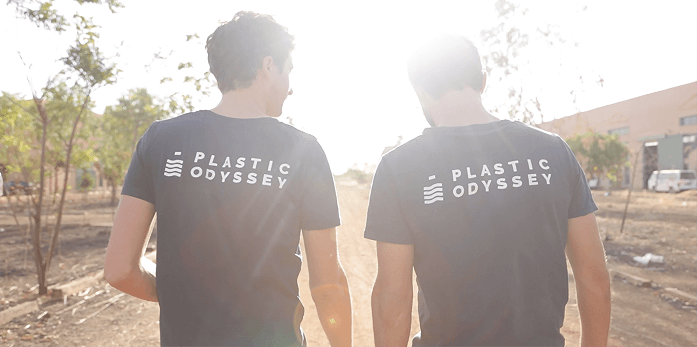 Two man from the back with Plastic Odyssey Polos