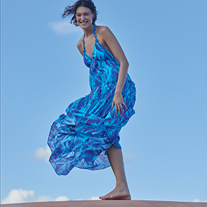 A woman wearing the Women Cotton Long Backless Dress Les Draps Froissés