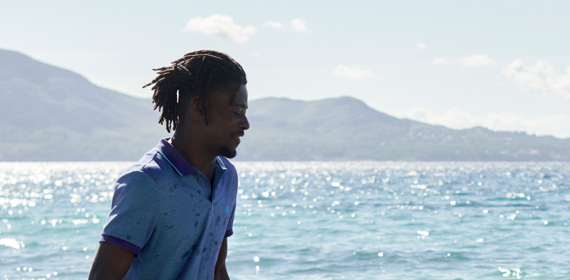 Men standing wearing a polo