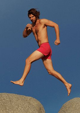 Man jumping on the rocks 