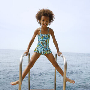 Girl wearing a one-piece swimsuit
