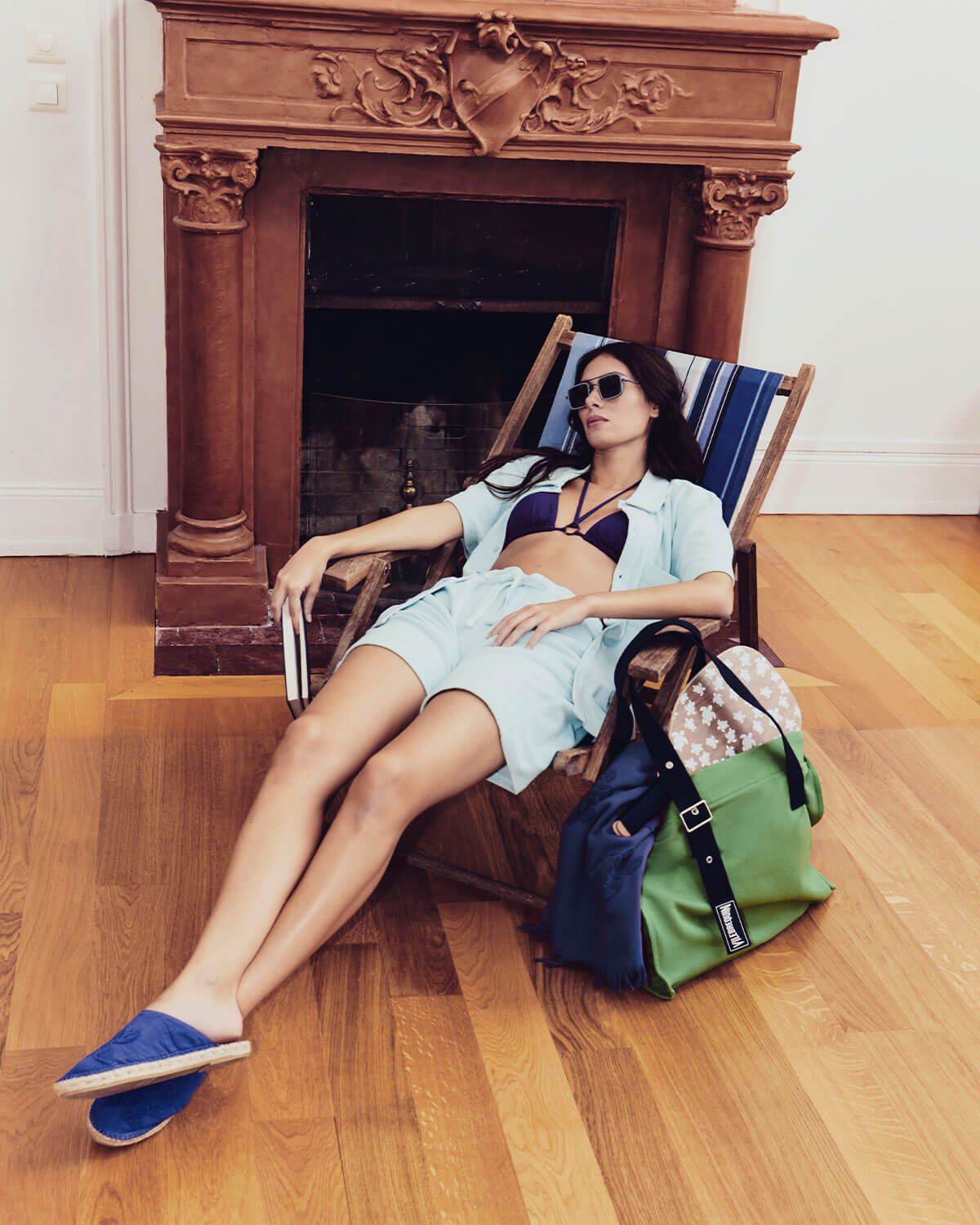 A woman on a sun lounger.