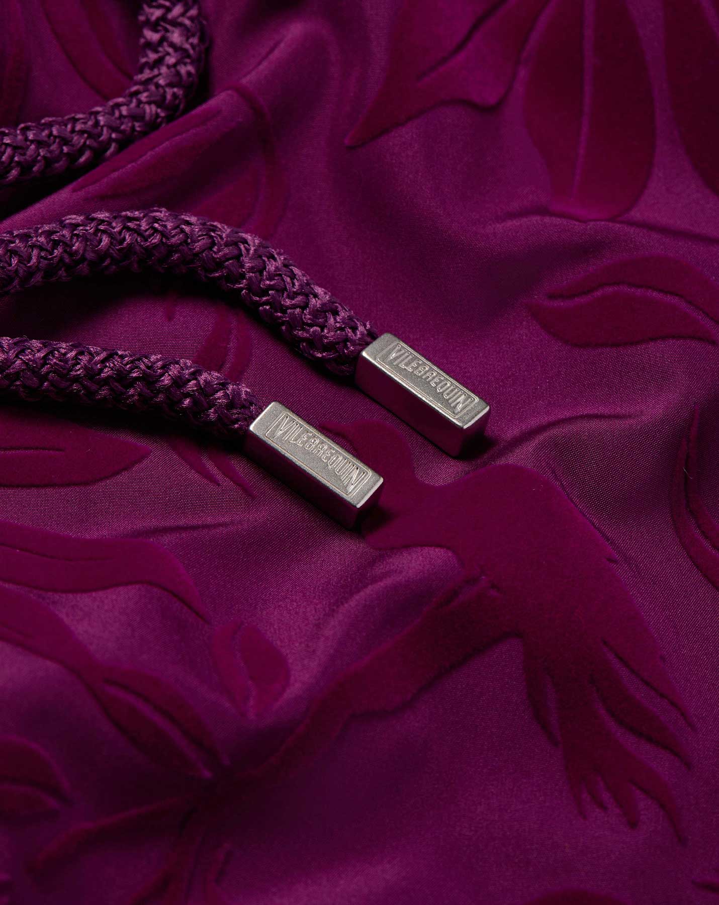 Zoom of flocked men swim shorts