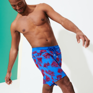 Picture of Men Long classic Printed - Men Swim Trunks Long 2018 Prehistoric Fish Flocked, Sea blue front worn view Picture of Men Long classic Printed - Men Swim Trunks Long 2018 Prehistoric Fish Flocked, Sea blue front worn view