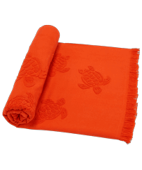 Beach Towel in Organic Cotton Turtles Jacquard Rust front worn view