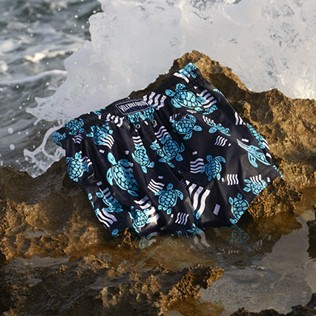 Picture of Men Short classic Printed - Men Swimwear Short and Fitted Stretch- Plastic Odyssey x Vilebrequin, Navy details view 6 Picture of Men Short classic Printed - Men Swimwear Short and Fitted Stretch- Plastic Odyssey x Vilebrequin, Navy details view 6