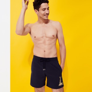 Men placed embroidery Swim Shorts The year of the Rabbit Navy front worn view