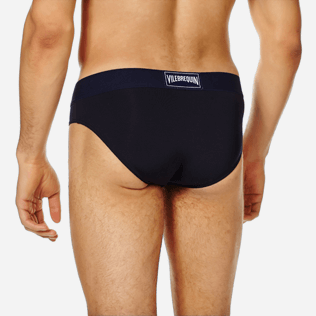 Hombre Slips y Boxers Liso - Bañador slip de color liso con cintura elástica para hombre, Negro supp1 Hombre Slips y Boxers Liso - Bañador slip de color liso con cintura elástica para hombre, Negro supp1